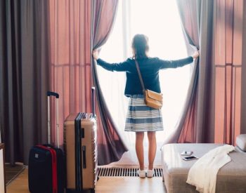 Girl staying at a hotel hilton status match