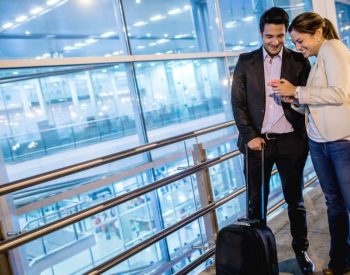 Traveling Couple How to Save Money Buying Airline Tickets